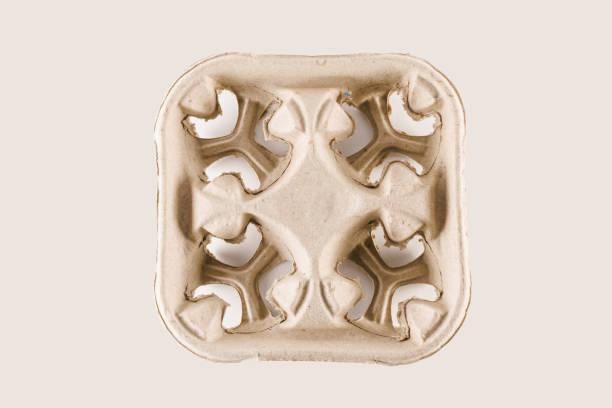 istock Eco friendly natural 4 coffee cup holder in with empty space. Disposable ecological utensils on white background. Sustainability of planet. Cardboard glass made of fiber of bamboo and bagasse. 1241978151