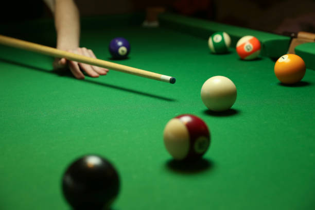 istock billiard background with color balls and cues 1241990613