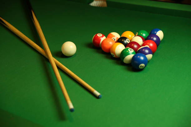 istock billiard background with color balls and cues 1241990627
