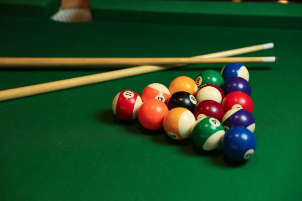 istock billiard background with color balls and cues 1241990649