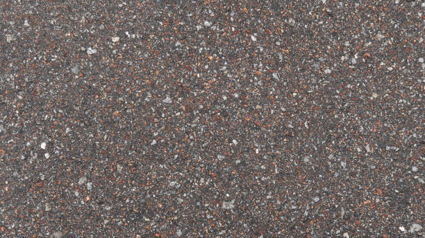 istock Multi colored asphalt structure. A lot of small rocks. Asphalt texture 1242018407