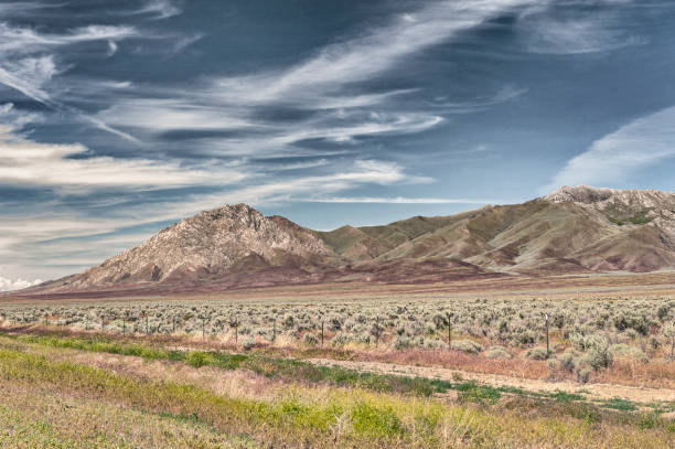 istock Horse Canyon Mountains in Nevada under a Cloudy Sky 1242038553