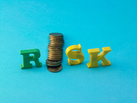 single word risk on the blue background