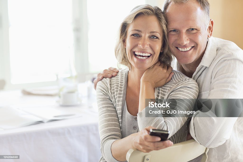 Portrait of happy couple at the breakfast table  Couple - Relationship Stock Photo
