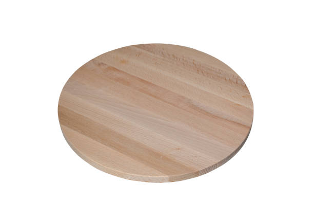 istock Round wood cutting board, plate isolated on a white background. 1242081706