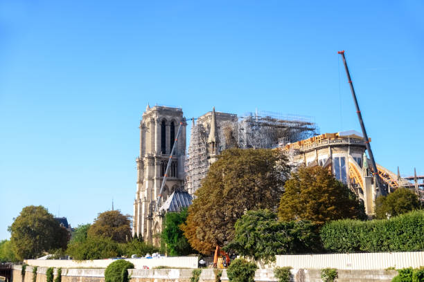 istock Notre de Paris rebuilding with the scaffolding 1242107020