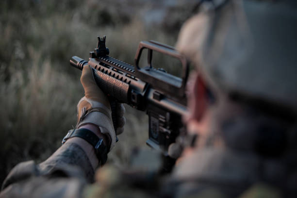 istock aiming with the soldier's gun 1242121128