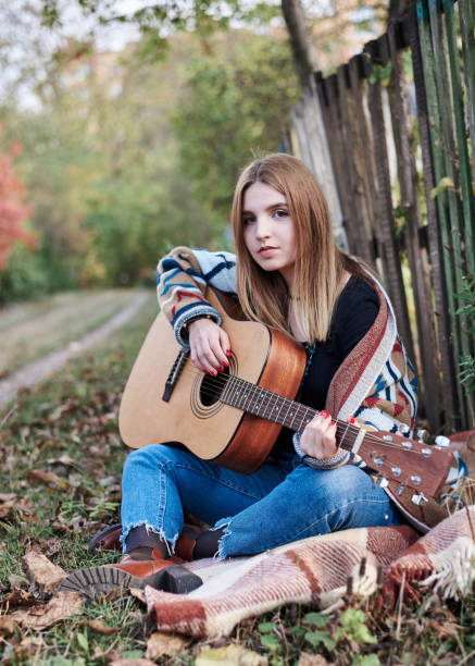 istock Hippie in the park 1242127323