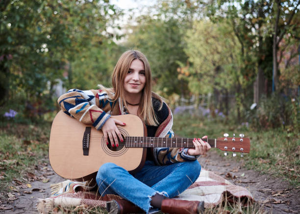 istock Hippie in the park 1242127373