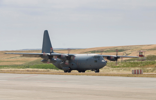 C-130 Hercules launching from runway