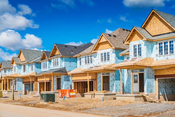 istock Detached Houses under construction in a new residential district 1242143496