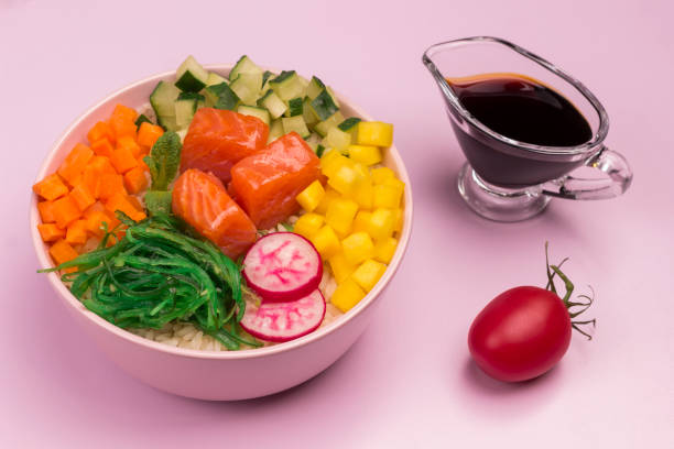 istock Poke bowls with raw red fish and vegetables. 1242170694