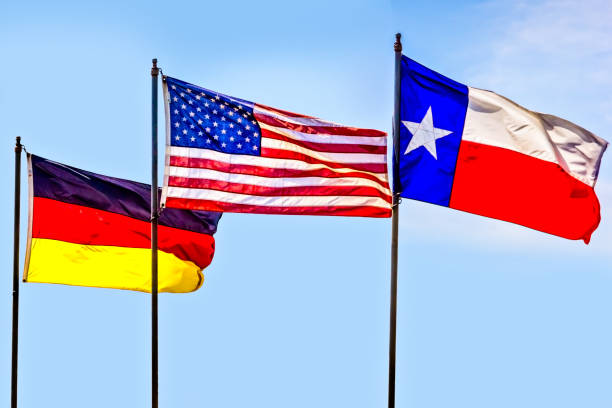 istock The flags of Germany, USA and Texas side by side 1242193964