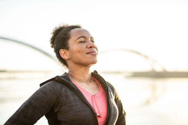 istock Sporty woman day dreaming. 1242196099