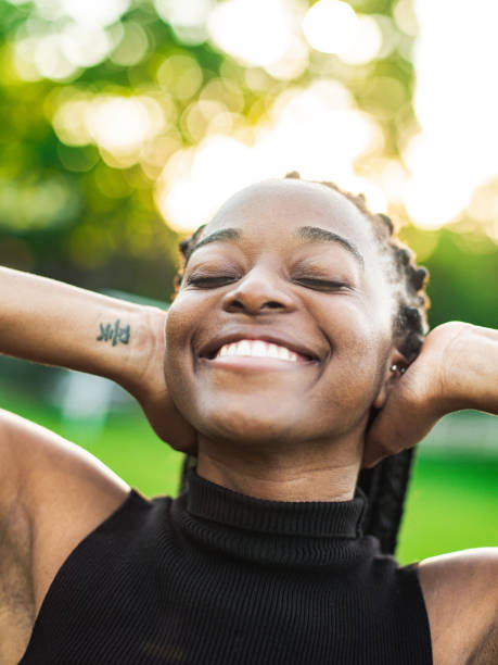 istock Dancing African woman in the park 1242225545