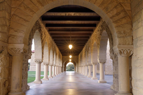 Arches and Columns Walkway in Stanford University, California Stanford, California - March 12, 2020: Arches and Columns Walkway in Stanford University stanford university photos stock pictures, royalty-free photos & images