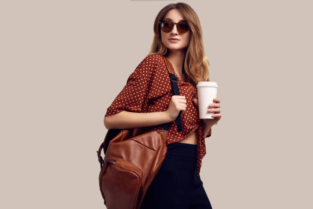istock young beautiful woman with backpack ready to travel 1242230936