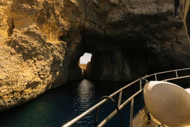 istock Boat going trough a tunnel on the sea 1242259547