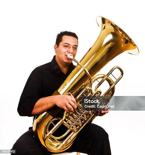 Tubaist Foto de stock y más banco de imágenes de Tuba - Tuba, Fondo blanco, Hombres