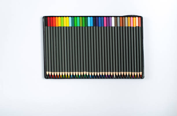 istock Colored pencils in a case on a white background 1242347656