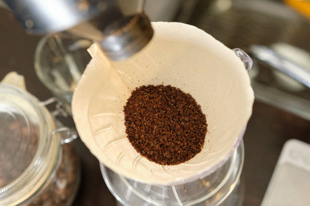 istock How to make coffee 9: Transfer the coffee grounds to the dripper 1242393485