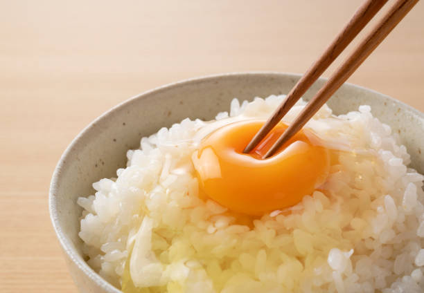 istock Rice with egg on a wooden backdrop. Traditional Japanese cuisine. 1242498867