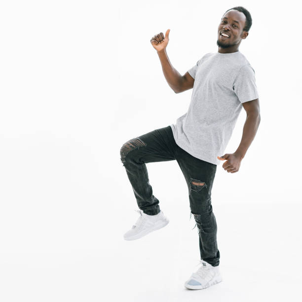 istock side view. happy guy showing thumbs up 1242512699