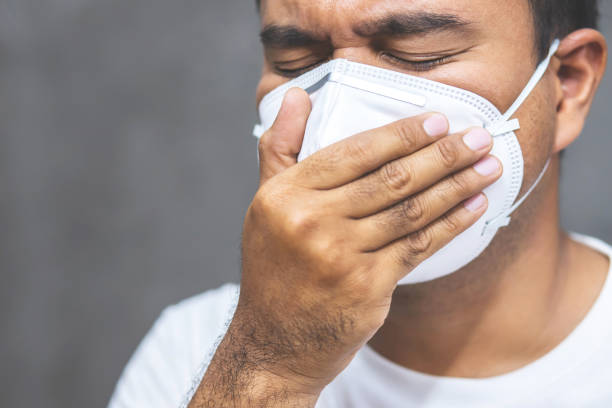 istock Man is wearing masks to protect against Corona virus 1242576480