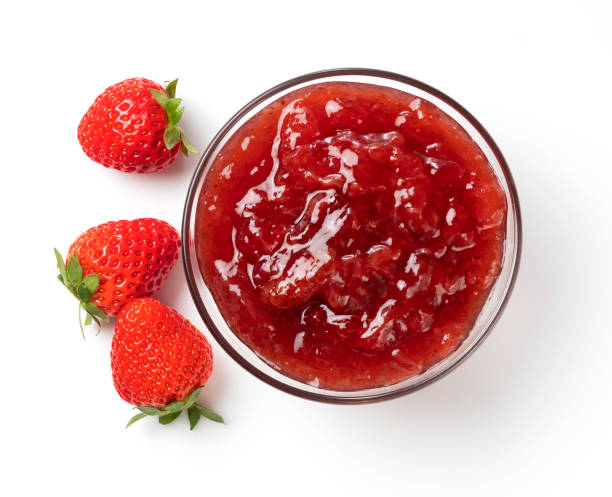 istock strawberry jam in a glass bowl on a white background 1242601374