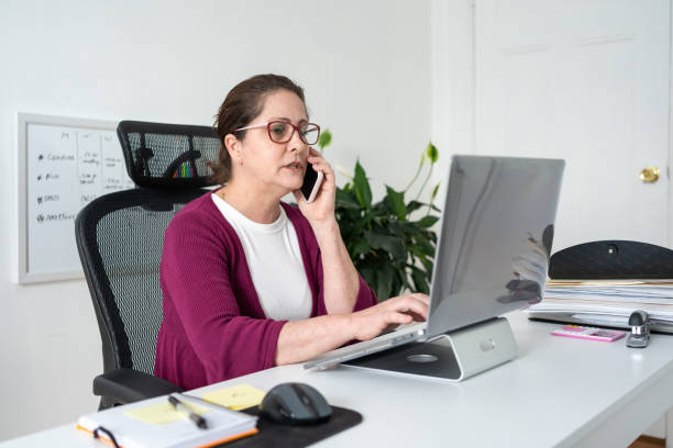 istock Woman working in a small office 1242607619