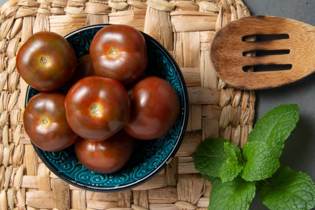 istock jar with organic tomatoes seen from above. 1242608659