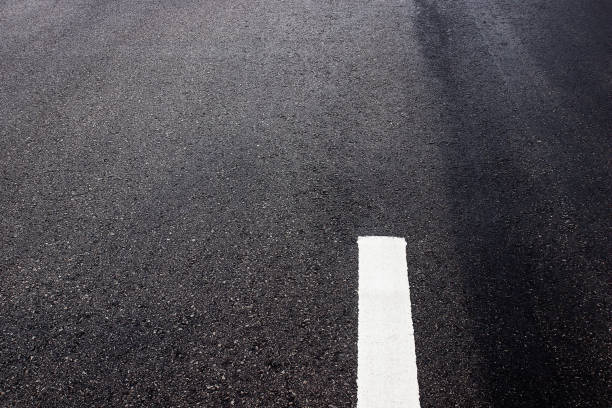 istock Asphalt background texture black construction the industry Lane blacktop roads 1242631471