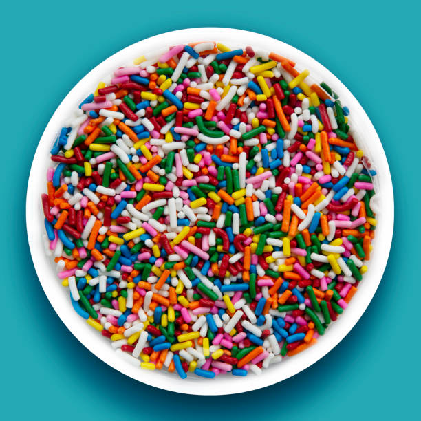 istock Bowl of colorful rainbow sprinkles 1242663290