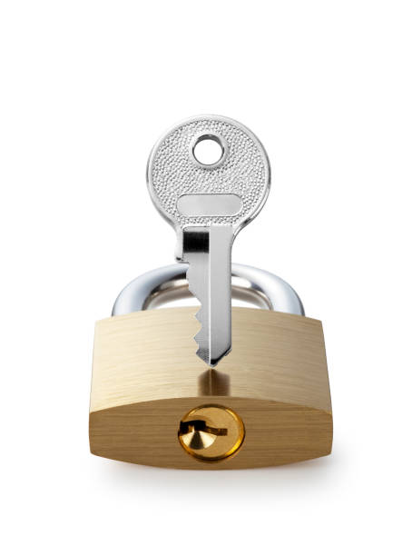 istock Metal padlock and key on white background 1242664856