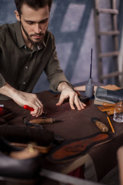 istock shoe production at shoe shop. 1242741968