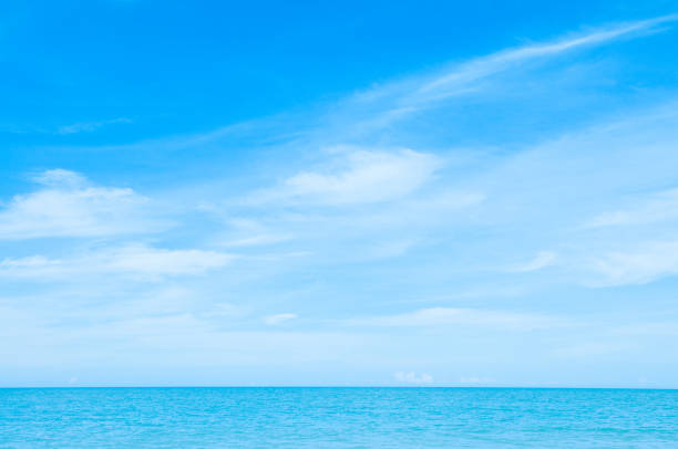 Beautiful blue sky with cirrus clouds over the sea. Skyline