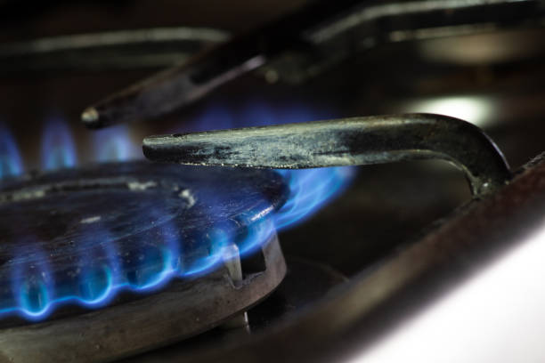 istock blue gas flame on a gas stove 1242855975