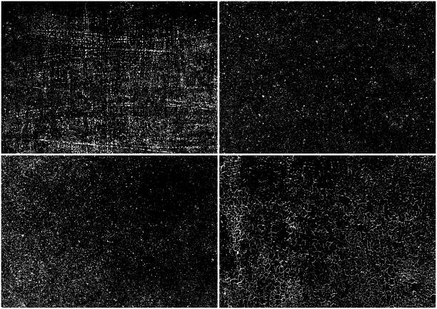 Grunge backgrounds Set of four grunge texture backgrounds. Rectangular backdrops. One color - black. scratched stock illustrations