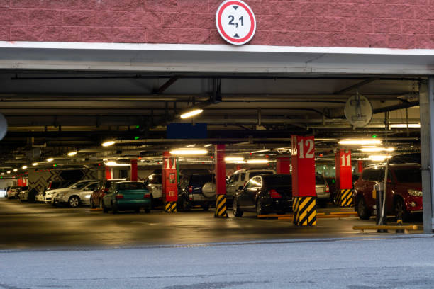 istock Underground parking or garage with cars 1242865998
