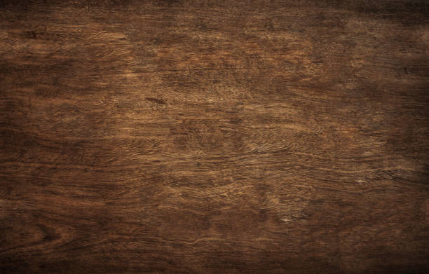 istock Brown wood texture, dark wooden abstract background. 1242873555