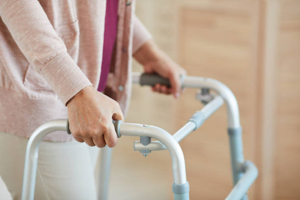 istock Woman walking with walker 1242876728