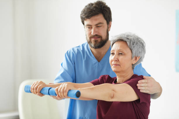 istock Woman training with doctor 1242880573