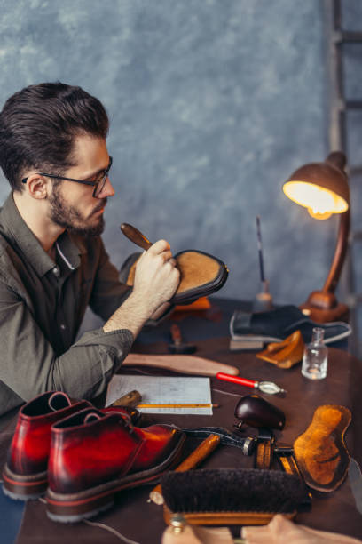 istock accurate working process in the shoe shop 1242890399