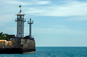 Lighthouse and ancient fortifications, Yalta, Ukraine translation - Sberbank of Russia