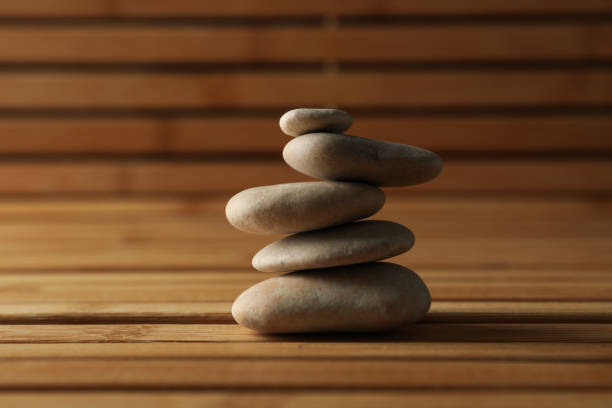 istock Stones on the bamboo background. Zen concept 1242948057