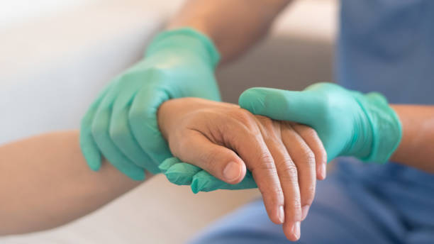 Surgeon, physician performs surgical operations, anesthetist or anesthesiologist holding patient's hand for checking state of and or support in ER room, Medical healthcare concept Surgeon, physician performs surgical operations, anesthetist or anesthesiologist holding patient's hand for checking state of and or support in ER room, Medical healthcare concept morphine drug stock pictures, royalty-free photos & images