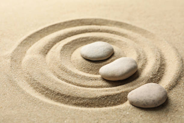istock Stones on the sand with patterns. Zen concept 1242958855