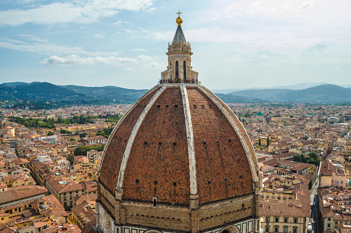 Florence cityscape with the dome of Florence Cathedral Santa Maria del Fiore. The view is from Florence Cathedral (Santa Maria del Fiore) bell tower (Giotto Campanile).