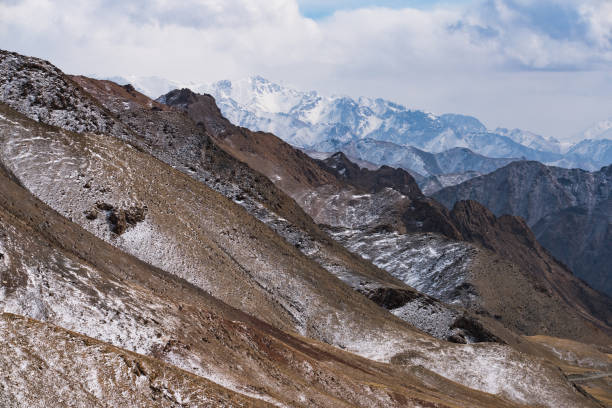 istock lanscape with barren mountain which is covered with ice 1242973438