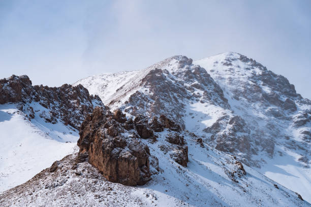 istock lanscape with barren mountain which is covered with ice 1242973460
